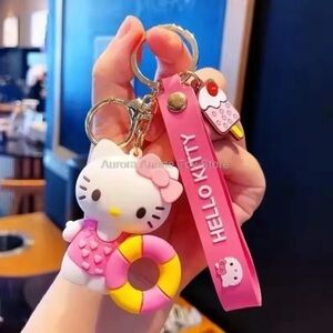 NWT Hello Kitty Keychain Kawaii | Pink Yellow and White Bagclip w/ Lolipop Charm